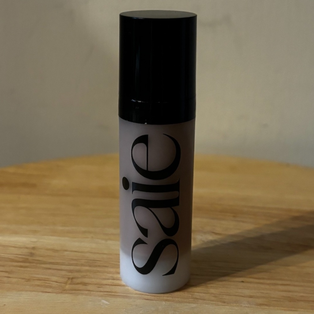 Saie Mini Glowy Super Gel Lightweight Dewy Highlighter in Sunglow mini size